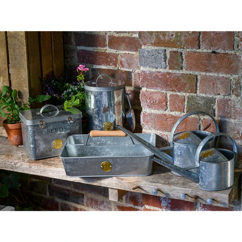 Galvanized seed storage box by Burgon & Ball, durable metal organizer for storing garden seeds and small gardening tools.